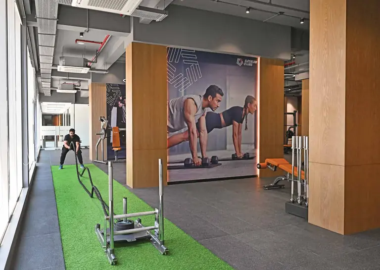 An Ileseum Club fitness floor at Dosti West County, Thane — the club operator behind the sports facilities at Dosti Greenscapes