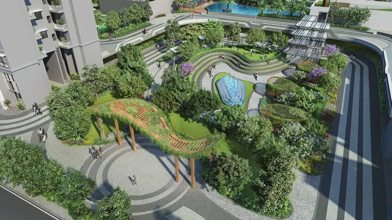 The landscaped podium at Dosti Greenscapes from above, showing the jogging loop, gardens and water features