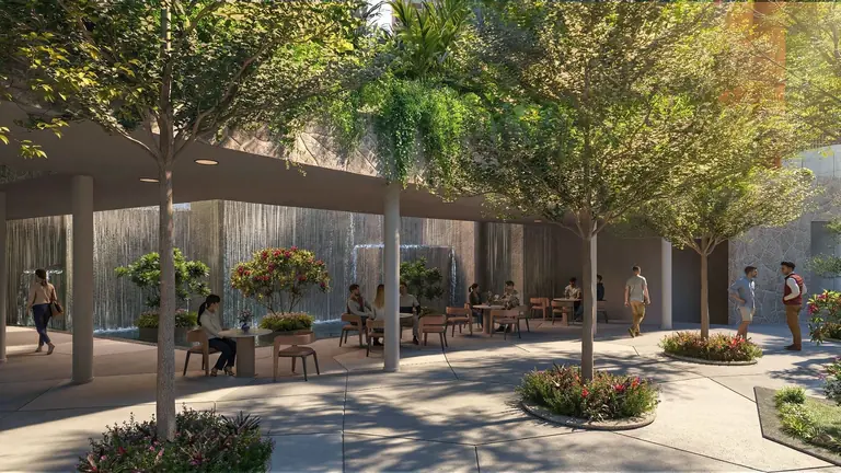 The tree court with seating under a canopy at Yashada EVO